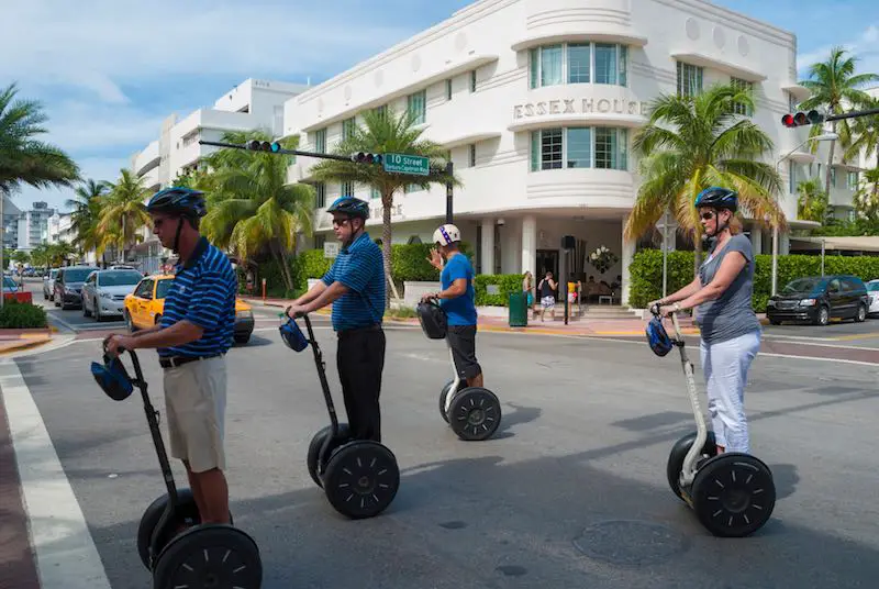 Group of tourists taking a turn on a street in Florida