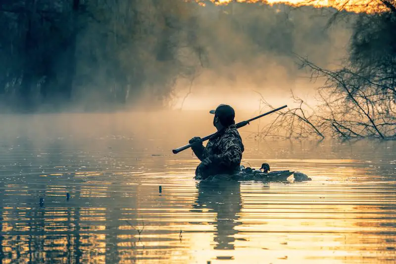 hunter immersed in water while duck hunting in Central Florida