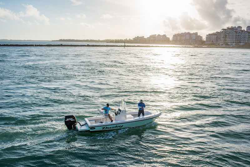 Two men on a small boat in Miami Florida