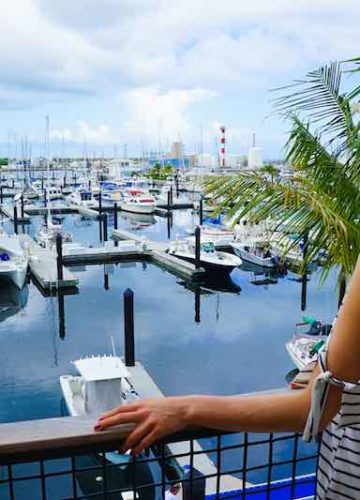 Blond Woman looking at a boat club in Central Florida