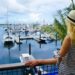 Blond Woman looking at a boat club in Central Florida