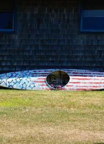 Kayak painted in the colors of the American Flag