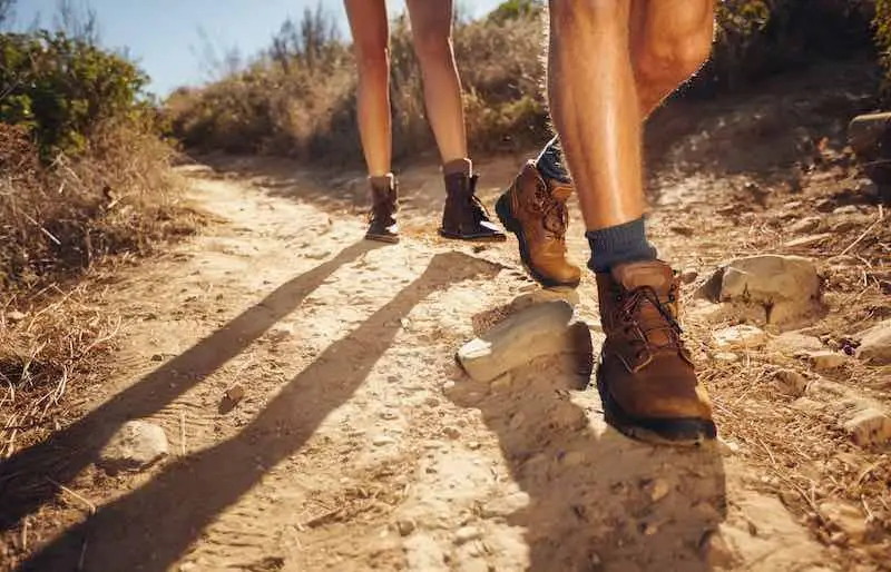Couple hiking in a hot day waring shorts
